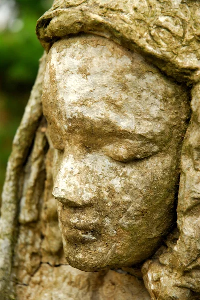 Weathered statue of a desperate woman — Stock Photo, Image