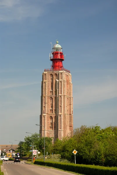 Leuchtturm auf der Spitze eines Glockenturms, Westkapelle, Holland — Stockfoto