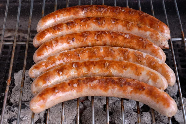 stock image Fried sausages on the barbecue