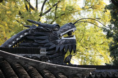 Chinese Dragon on the roof in Yuyuan Garden. Shanghai China clipart