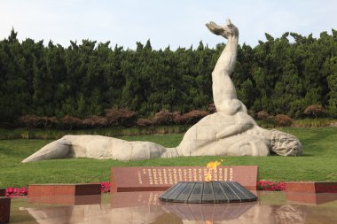 Monument at the Long Hua Martyrs' Cemetery in Shanghai, China. clipart