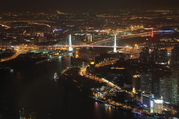 Huangpu rzeka i nanpu most nocą. Shanghai, Chiny — Zdjęcie stockowe