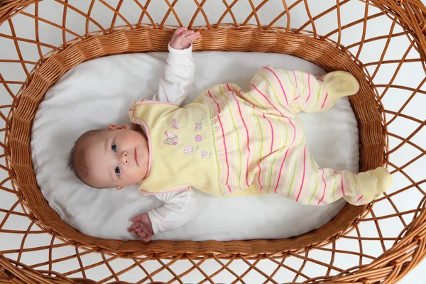 Baby in bassinet — Stock Photo, Image