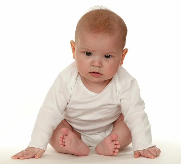 Baby zittend op de vloer — Stockfoto