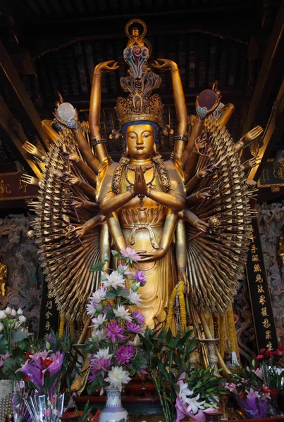 Multi armed buddha statue in Longhua Temple, Shanghai China — Stock Photo, Image