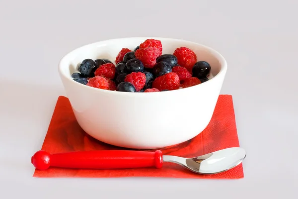 stock image Bowl with berries on a white background