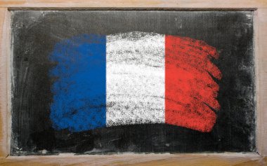 Flag of France on blackboard painted with chalk