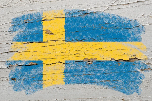 Bandera de Suecia en grunge textura de madera pintada con tiza —  Fotos de Stock