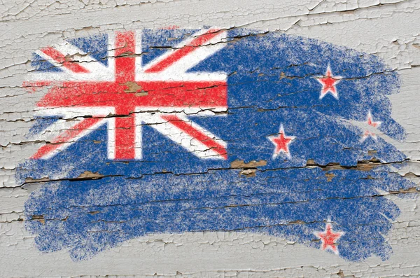 Flag of New Zealand on grunge wooden texture painted with chalk — Stock Photo, Image
