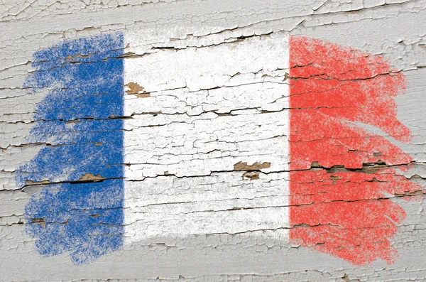 Flag of France on grunge wooden texture painted with chalk — Stock Photo, Image
