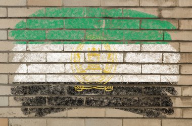 Flag of afghanistan on grunge brick wall painted with chalk clipart