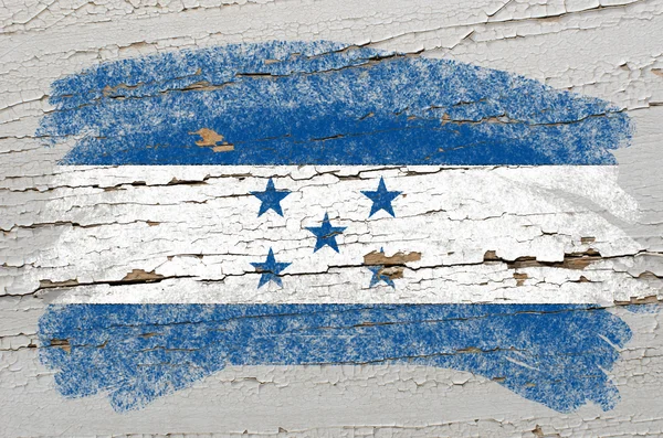Bandiera dell'Honduras su grunge texture in legno dipinta con gesso — Foto Stock