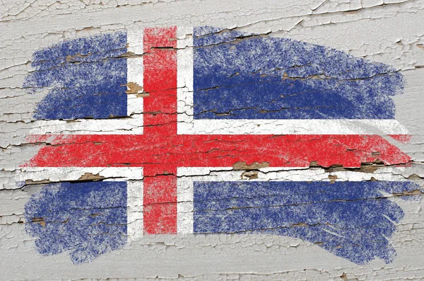 Vlajka Islandu na grunge dřevěné textury namalované křídou — Stock fotografie