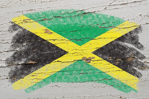 Flag of jamaica on grunge wooden texture painted with chalk — Stock Photo, Image