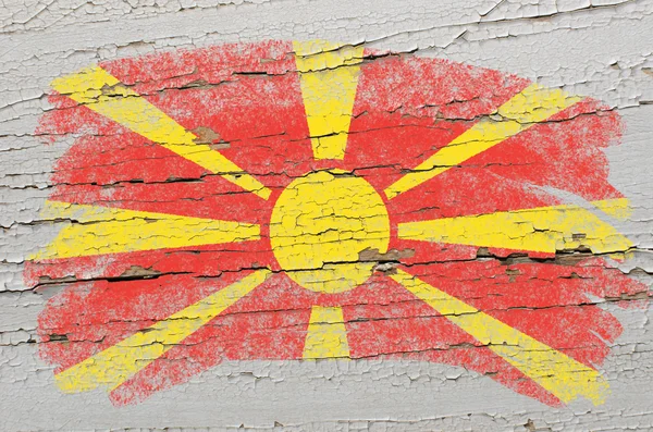 Flag of macedonia on grunge wooden texture painted with chalk — Stock Photo, Image