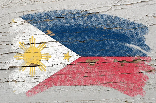 Vlajka Filipíny na grunge dřevěné textury namalované křídou — Stock fotografie