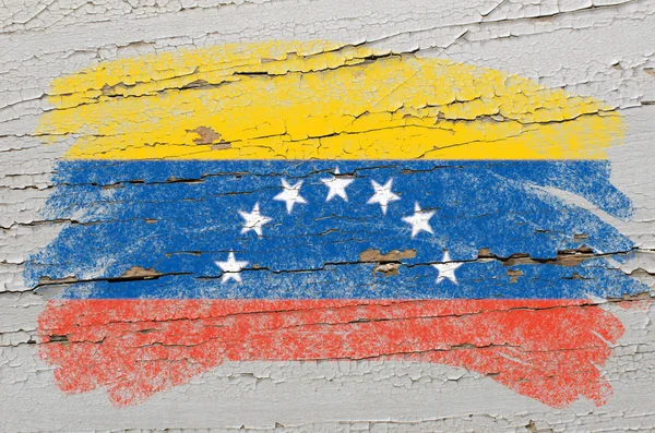 Flag of venezuela on grunge wooden texture painted with chalk — Stock Photo, Image