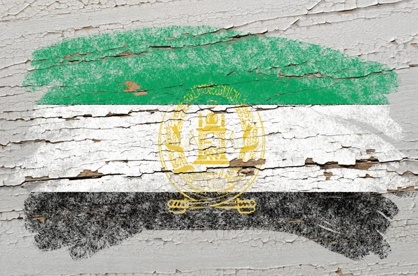 Vlajka Afghánistánu na grunge dřevěné textury namalované křídou — Stock fotografie