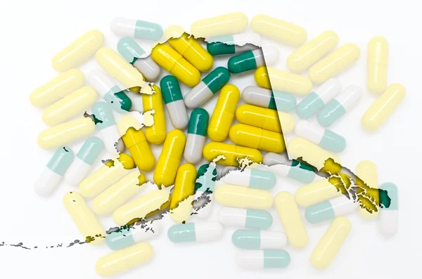Outline Alaska mappa di con pillole trasparenti sullo sfondo — Foto Stock