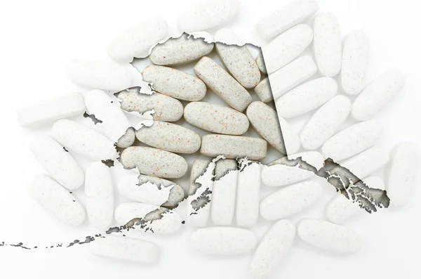 Περίγραμμα Αλάσκα της με διαφανή χάπια στο παρασκήνιο — Φωτογραφία Αρχείου