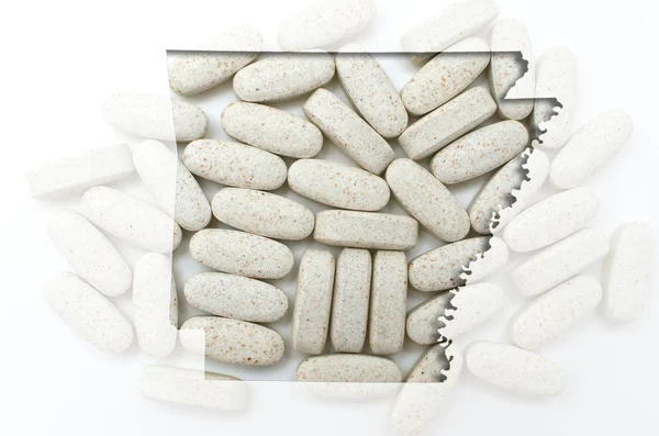 Περίγραμμα Αρκάνσας της με διαφανή χάπια στο παρασκήνιο — Φωτογραφία Αρχείου
