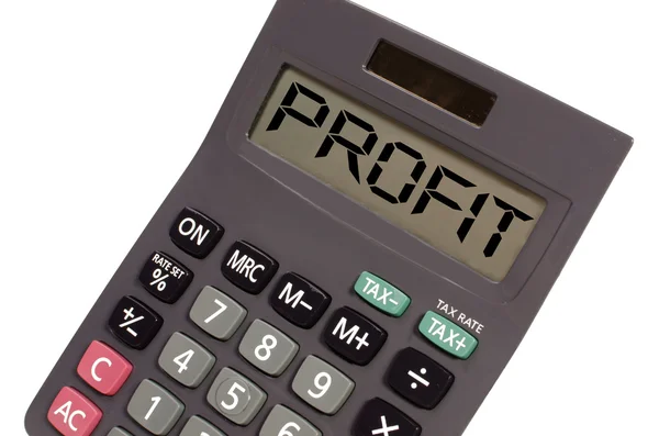 Antigua calculadora sobre fondo blanco que muestra el texto "beneficio" en pers —  Fotos de Stock