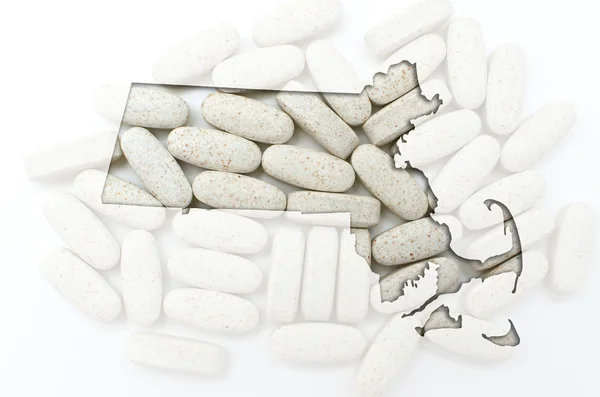 Outline mappa del Massachusetts con pillole trasparenti nella schiena — Foto Stock