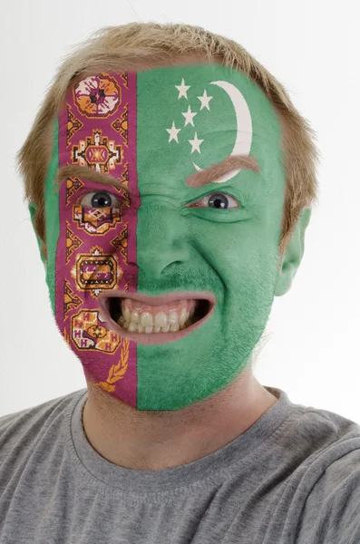 Πρόσωπο της τρελό θυμωμένος άνθρωπος που χρωματίζονται στα χρώματα της σημαίας του Τουρκμενιστάν — Φωτογραφία Αρχείου