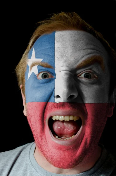 Face of crazy angry man painted in colors of Chile flag — Stock Photo, Image