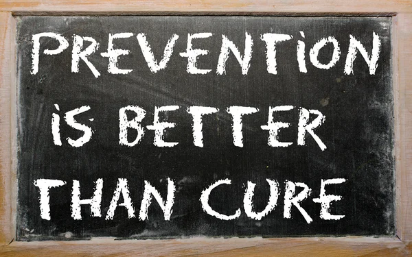 Proverb "Prevention is better than cure" written on a blackboard — Stock Photo, Image
