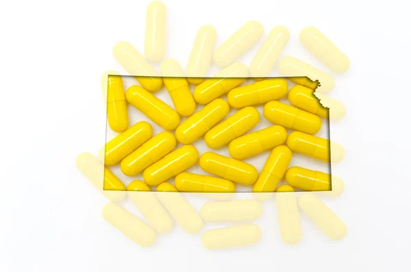 Térképének körvonala kansas a háttérben átlátszó Pills — Stock Fotó