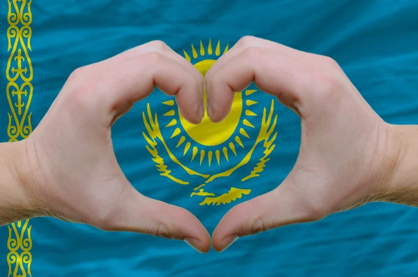 Heart and love gesture showed by hands over flag of kazakstan ba — Stock Photo, Image