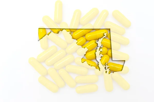 Mapa do contorno de Maryland com pílulas transparentes em segundo plano — Fotografia de Stock