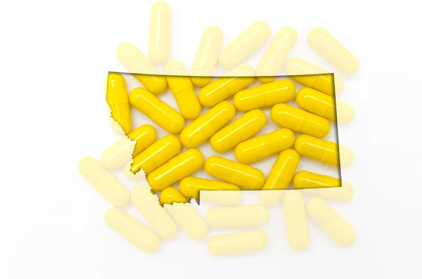 Kaart van het overzicht van montana met transparante pillen op de achtergrond — Stockfoto