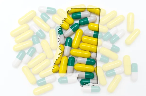 Outline map of mississippi with transparent pills in the backgro — Stock Photo, Image