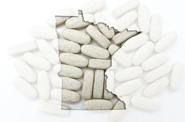 Outline map of minnesota with transparent pills in the backgroun — Stock Photo, Image