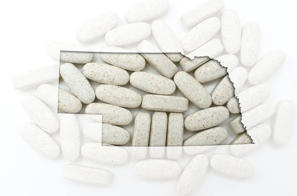 Περίγραμμα της Νεμπράσκα με διαφανή χάπια στο παρασκήνιο — Φωτογραφία Αρχείου