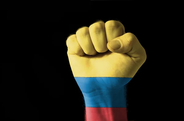 Pięść pomalowane w kolorach flagi columbia — Zdjęcie stockowe