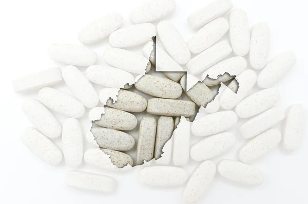 Outline map of west virginia with transparent pills in the backg — Stock Photo, Image