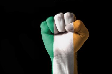 Fist painted in colors of ireland flag clipart