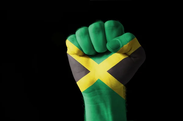 ジャマイカ国旗の色で描かれた拳 — ストック写真
