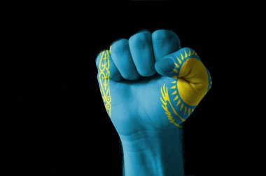 Fist painted in colors of kazakstan flag clipart