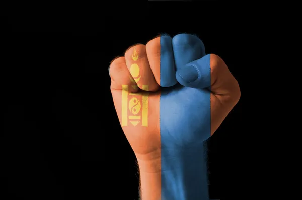 Fist painted in colors of mongolia flag — Stock Photo, Image