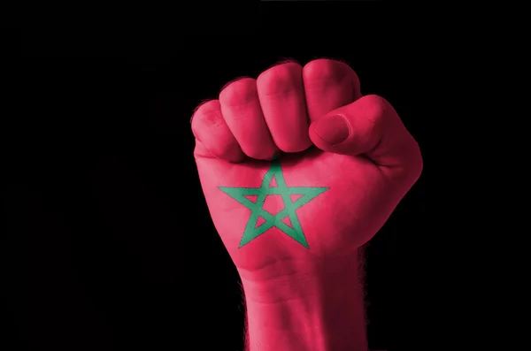 Vuist geschilderd in kleuren van Marokko vlag — Stockfoto