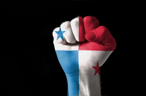 Кулак, раскрашенный в цвета флага Панамы — стоковое фото