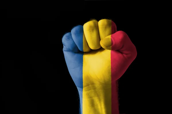 Pięść pomalowane w kolorach flagi Rumunii — Zdjęcie stockowe