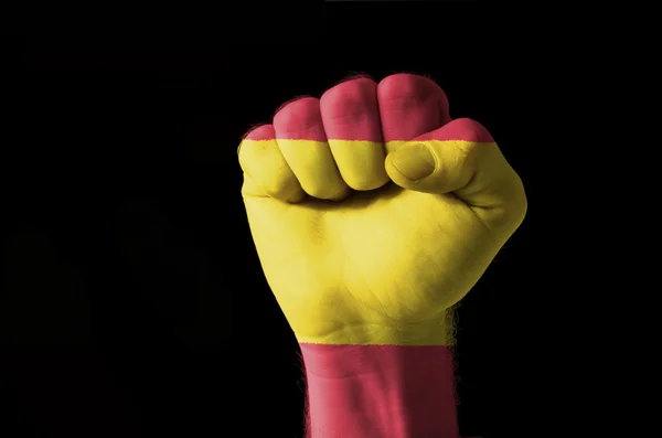 Näve målade i färgerna på Spanien flagga — Stockfoto
