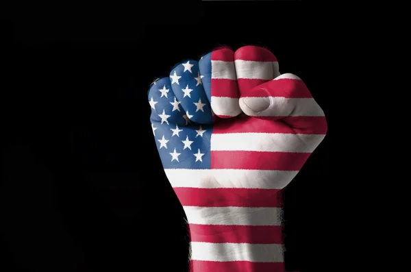 Кулак раскрашен в цвета флага США — стоковое фото