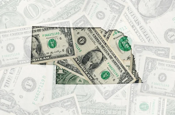 Konturkarta över nebraska med transparent amerikanska dollar banknot — Stockfoto