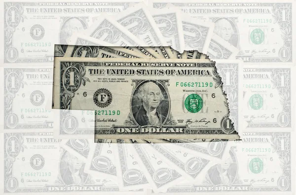 Mapa do esboço de nebraska com o banknot transparente do dólar americano — Fotografia de Stock